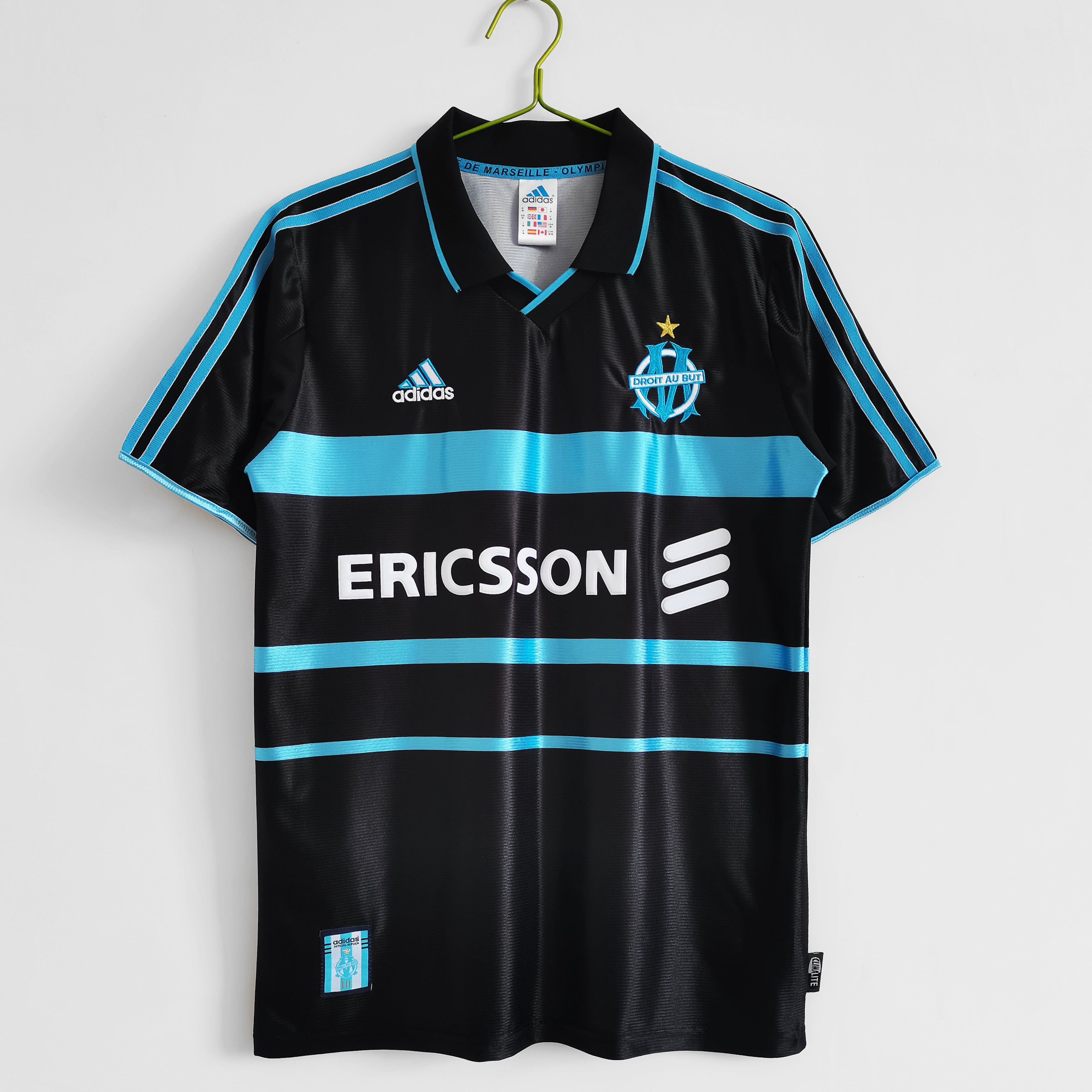 OM 1999 retro bortedrakt